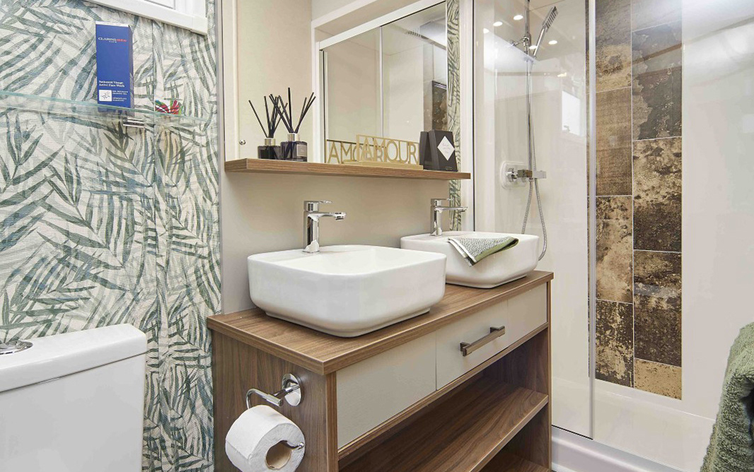 Modern shower room with dwim basen's, shower and toilet in the Langham caravan